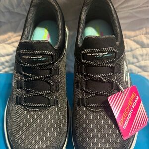 Skechers Lightweight Slip-On Sneakers in Black with Mint Insole